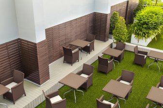 Кресло пластиковое плетеное с подушкой Siesta Contract California коричневый