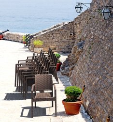 Кресло пластиковое плетеное Siesta Contract Ibiza коричневый